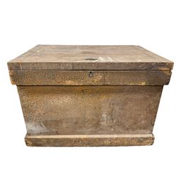 Hardwood trunk, the hinged lifting lid opening to reveal storage space, raised on a plinth base 