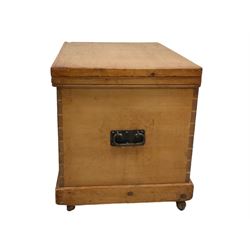 Late 19th century rustic pine blanket chest, rectangular hinged lid with iron fixings, iron handles to each side, on castors