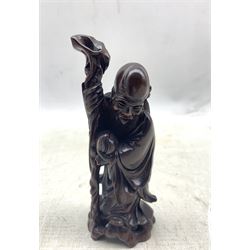 Chinese carved wood figure of Shou Lou holding a staff H13cm, another of Guan Yin H25cm and a Chinese embroidered panel 36cm x 20cm