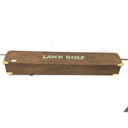 Reproduction part lawn golf set, comprised of different types of hole markers, a club and various golf balls 