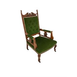 Walnut framed armchair, upholstered in green fabric together with three other chairs in similar design