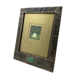 Arts & Crafts beaten silver-plated picture frame, of rectangular form with Ruskin style oval pottery plaque, cloth back with easel stand, 33cm x 26cm 