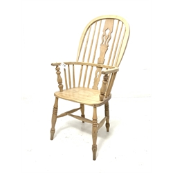 19th century stripped ash and elm Windsor armchair, hoop, spindle and splat back, shaped saddle seat, raised on ring turned supports with 'H' stretcher 