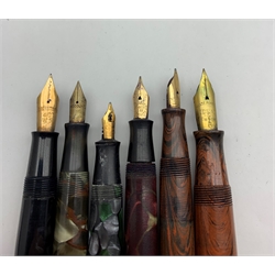 Watermans fountain pen with 14ct gold nib marked 'Account' and in marbled case, Watermans English made fountain pen with 14ct gold nib, two other Watermans pens and two Burnham pens with 14ct gold nibs 