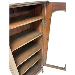 Victorian mahogany bookcase, the two glazed doors opening to reveal four shelves, raised on cabriole supports  W125cm, H167cm, D42cm 