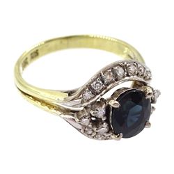 14ct gold oval cut sapphire and round brilliant cut diamond cluster ring, stamped
