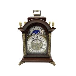  20th century miniature 8-day bracket clock - in a mahogany case with carrying handle, etched brass dial with a silvered chapter ring, Roman numerals and pierced brass hands, cherub spandrels and working rolling moon to the arch, Hermle floating balance movment strinking the hours and half-hours on two bells. 