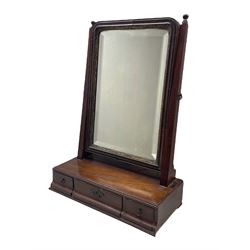George III mahogany dressing or toilet mirror, the rectangular plate with moulded frame and gilt slip, the base outswept to lower edge with three drawers and brass handles and escutcheon, H64cm x W46cm 
