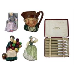 Three Royal Doulton figures, Joan HN2023 withdrawn 1959,  The Old Balloon Seller HN1315, Buttercup HN2309, Old Charlie character jug and a cased set of six Royal Crown Derby knives
