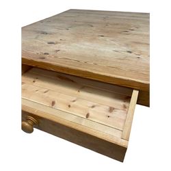 Victorian style pine square table, the square top over two frieze drawers raised on turned supports W122cm, D121cm, H77cm 