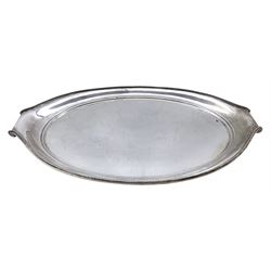 Dutch silver oval tray with bead edge decoration and scroll handles circa 1925  L46cm  32.4oz