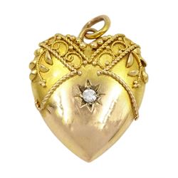 Victorian Etruscan revival gold heart shaped pendant, set with a single old cut diamond, stamped 15ct