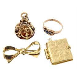 Gold Holy Bible pendant/charm, gold stone set fob and a bow bar brooch, all hallmarked 9ct and an 8ct gold sapphire ring, stamped 333