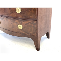 Early 19th century mahogany bow front chest, two short and three long drawers, the frieze inlaid with walnut panels and boxwood stringing, oval plate handles, shaped apron with out splayed bracket supports, W110cm (max), H106cm, D53cm
