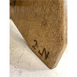 Yorkshire oak coffee table, the rectangular top raised on shaped panel end supports carved with Yorkshire rose roundels, united by pegged stretcher, carved with initials JN
