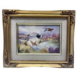 20th century rectangular porcelain panel by E.R. Booty, hand painted with two Setters flushing a Pheasant against a highland landscape, signed E.R. Booty, set within gilt frame, 11.5cm x 16.5cm 