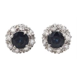 Pair of 18ct white gold round green/blue sapphire and diamond cluster stud earrings, London 1960, total sapphire weight approx 1.05 carat