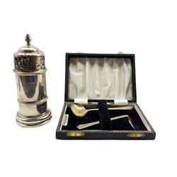 Silver cylindrical sugar castor with pierced cover H13cm Birmingham 1922 and a babies silver spoon and pusher, cased 5oz