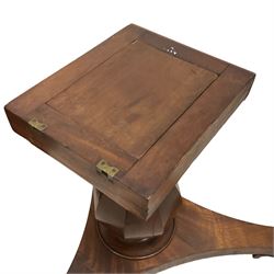 Early Victorian plum pudding mahogany and mahogany breakfast table, circular top with twelve segmented veneer panels, faceted vasiform pedestal on concaved triangular platform, on scroll carved feet with recessed castors (no pins)