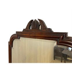 Victorian figured walnut Duchess dressing table, raised swing mirror back with bevelled plate, flanked by carved scroll and foliate decorated supports over a hinged dome compartment flanked by two banks of three drawers, the serpentine front fitted with single frieze drawer, raised on turned and lobe carved baluster supports with a shaped platform base