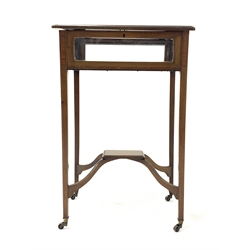 Small Edwardian mahogany bijouterie table, the glazed and banded top lifting to reveal velvet lined interior, raised on square tapered supports united by under tier,  terminating in brass castors, 48cm x 36cm, H74cm