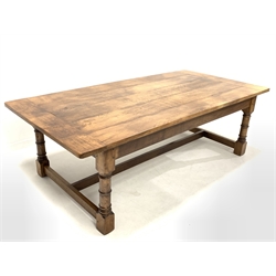 Large solid oak refectory style dining table, raised on ring turned and block supports united by 'H' stretcher, 244cm x 120cm, H76cm