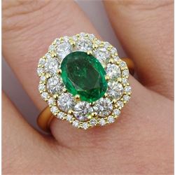 18ct gold oval emerald and diamond cluster ring, stamped 750, emerald approx 1.15 carat, total diamond weight approx 1.20 carat