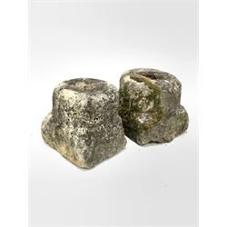 Two small carved and well weathered post base stones W27cm