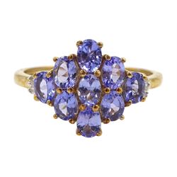 9ct gold oval tanzanite and baguette cut diamond cluster ring, hallmarked