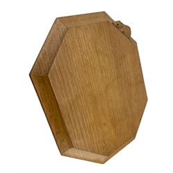 Mouseman - adzed oak breadboard, extended octagonal form with moulded edge carved with mouse signature, by the workshop of Robert Thompson, Kilburn 