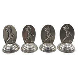 Set of four Edwardian novelty silver menu/ place card holders, the oval back plates embossed with a Golfer in full swing, on domed bases modelled as golf balls, hallmarked Sampson Mordan & Co Ltd, Chester 1906, H5.5cm