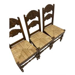 Set six Yorkshire style dining chairs, with carved cresting and back rail over rush seat, raised on turned bobbin supports 