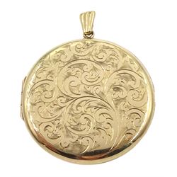 9ct gold circular hinged locket, with engraved decoration, hallmarked