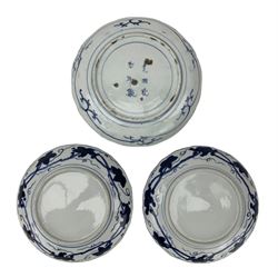 Pair of Japanese Edo period Arita blue and white dishes, centrally painted with flowering branches and trailing leaves and a border of mythical creatures and vases, shaped brown painted rims, D18.5cm, together with another Japanese Artia ware dish, painted in blue and white, Chenghua six-character mark beneath (3)