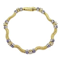Yellow and white gold round tanzanite and diamond link bracelet, stamped 14K