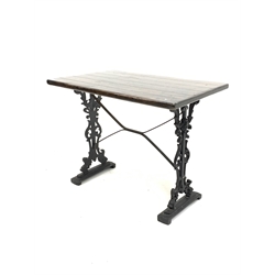 Victorian design cast iron pub table, with stained pine top and supports decorated with scrolled foliate, 90cm x 60cm, H73cm
