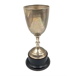 Silver challenge cup inscribed 'Stores Dpt. GPO' on wooden plinth H28cm overall London 1912 6.4oz