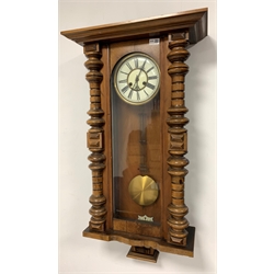 Walnut and beech cased Vienna style wall clock, with white dial with Roman chapter ring, twin train movement striking hammer on coil, H98cm