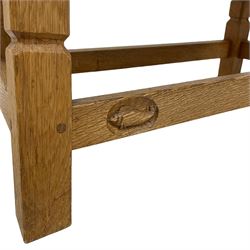 Fishman - figured oak occasional table, oval drop-leaf top, splayed tapered square supports united by stretchers, carved with fish signature, by Derek Slater, Crayke 