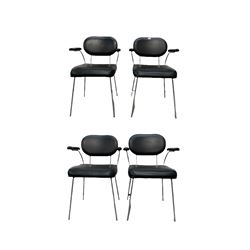 Set of four leather and metal chairs