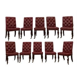 Set ten mid-19th century mahogany boardroom chairs, upholstered in buttoned oxblood faux leather, turned and faceted supports with raised panels, on brass castors 