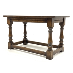  Traditional oak rectangular coffee table, with rectangular top raised on turned and block supports united by stretchers, 84cm x 52cm, H46cm  