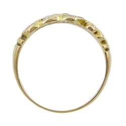 Early 20th century gold three row diamond ring, with scroll shoulders, stamped 15ct