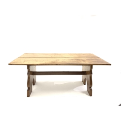 Early 20th century hardwood refectory style table, the rectangular top raised on shaped panel end supports united by pegged stretcher,  91cm x 183cm, H77cm