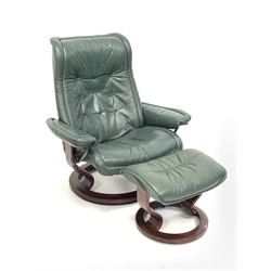 Stressless recliner swivel armchair upholstered in green leather with matching footstool