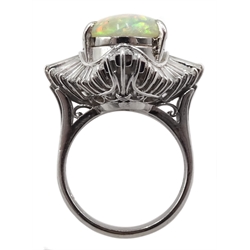 Platinum oval cabochon opal and baguette diamond ring, stamped 900, opal 4.48 carat, diamond total weight 2.17 carat 