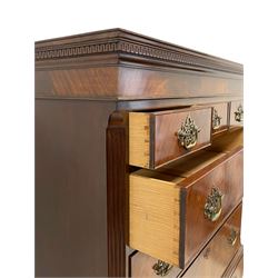 Waring and Gillows - mid-20th century mahogany Georgian style chest on chest,  projecting cornice over plain frieze, canted form with fluted upright corners, three small drawers over six long drawers, lower mould on ogee bracket feet, metal label to drawer