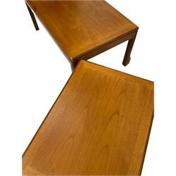 G-Plan -A Mid century teak coffee table with cross banded top raised on square supports (106cm x 62cm, H46cm) and another smaller coffee table (74cm x 62cm, H46cm) 