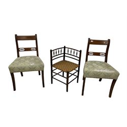 Pair Regency mahogany dining chairs, redded frame with satinwood stringing and pierced centre rail; and early 20th century corner chair with rush seat (3)