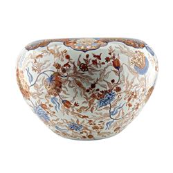 Large Chinese porcelain jardiniere of ovoid form with turned-in rim and decorated in the Imari palette with overglaze iron red and blue floral decoration, heightened in gilt, H37cm x D54cm approx